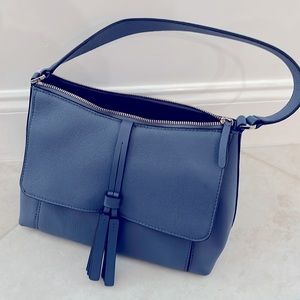 Beautiful blue Kate Spade handbag with tassels. Perfect for spring. Never used.